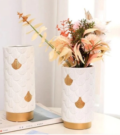 cream and gold vase