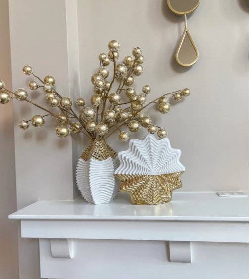 gold and white stripped vases